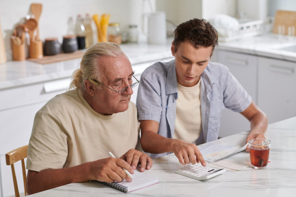 Senior and adult child planning for the future